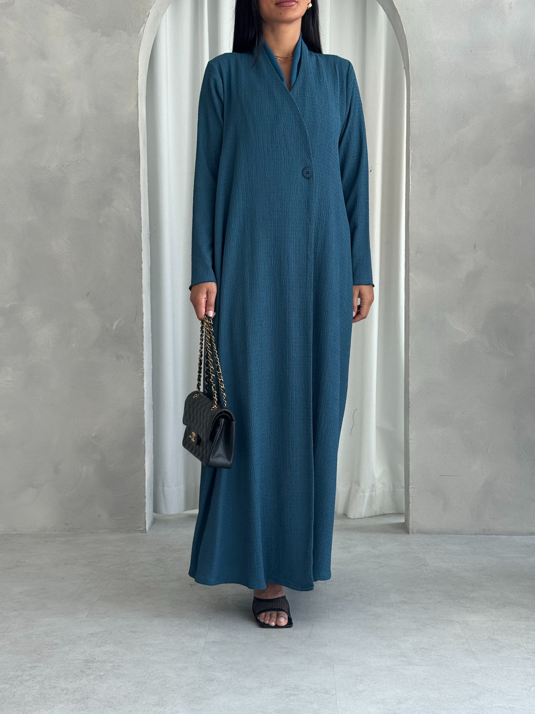 Huda in Teal