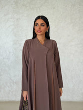Muna in Brown