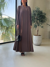 Muna in Brown