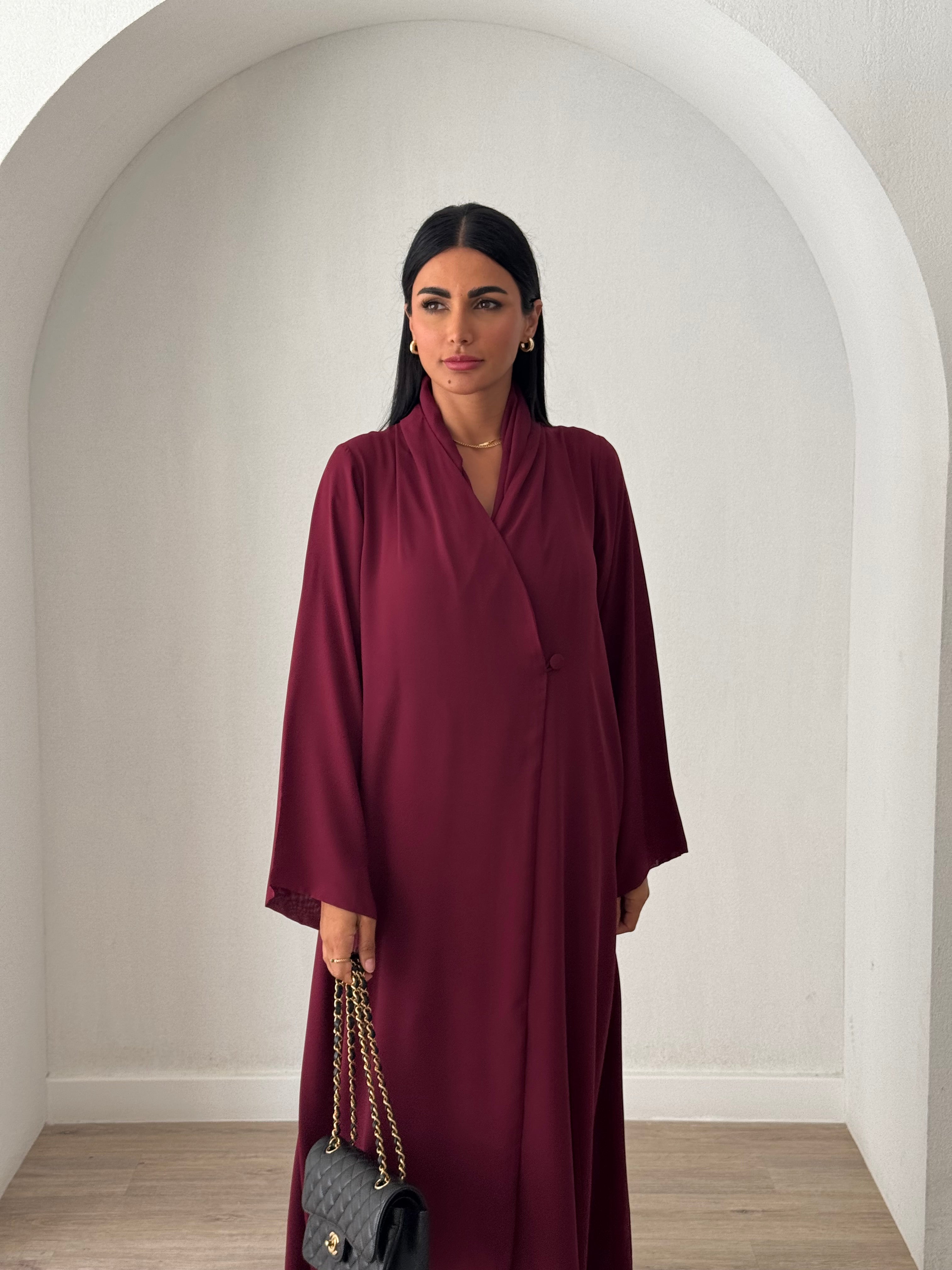 Manal in Maroon