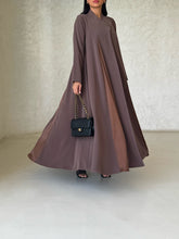 Muna in Brown