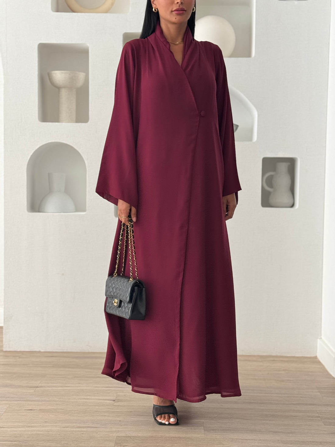 Manal in Maroon